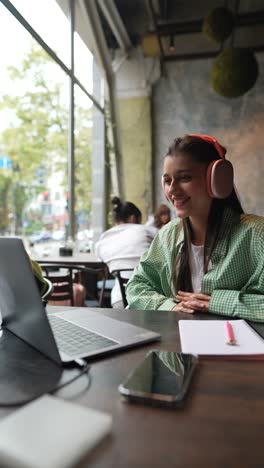 young woman working in a coffee shop