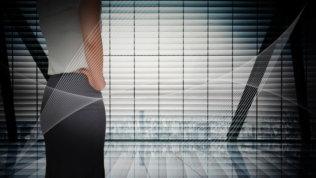 Animation of glowing white light over caucasian businesswoman by window with cityscape