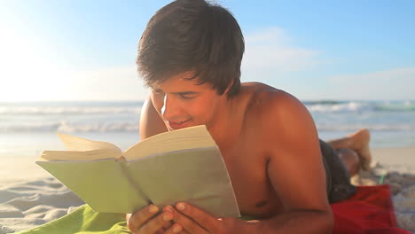 handsome man reading a book