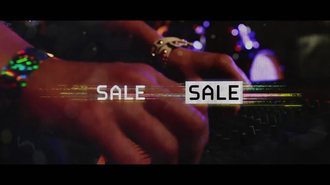 animación de venta en texto en blanco y negro con distorsión de color sobre mezclador de sonido en un concierto de rock