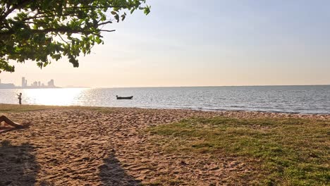 serene beach scene with sunrise and ocean view