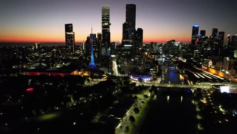 aerial circling melbourne south bank arts district golden glow sunset