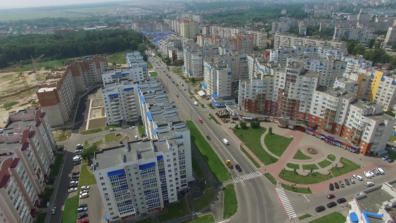 Beautiful view over modern part of the city with many high buildings in a sunny day. New built residential complex. Aerial view