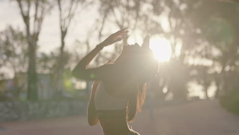 dancing woman young hip hop dancer in city enjoying fresh urban freestyle dance moves practicing expression at sunset close up