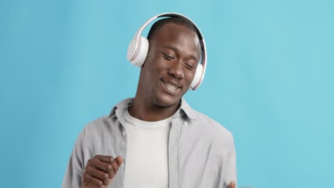 man dancing with headphones