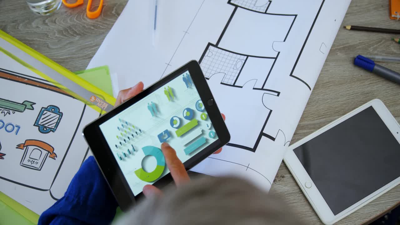 Executive using digital tablet