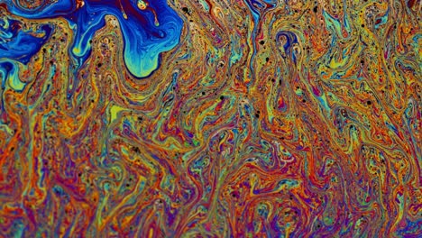 different colors from liquid solution moving in swirling motion