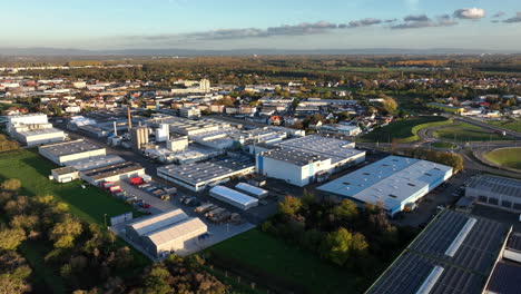 warehouse and fabrication buildings of renolit se, headquarters in worms, germany at golden hour