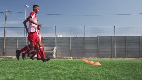 Soccer-players-training-on-field