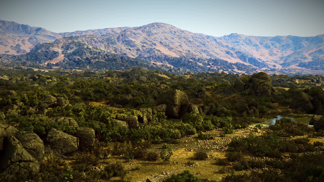 paisaje montañoso con rocas y árboles verdes