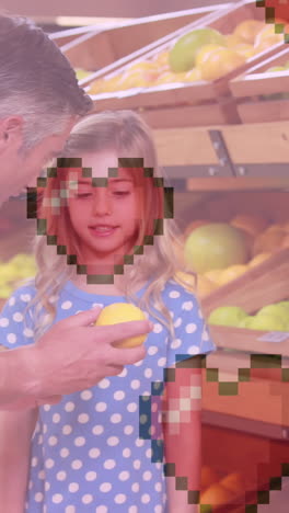 animación de iconos de corazón sobre padre caucásico con hija sosteniendo limón