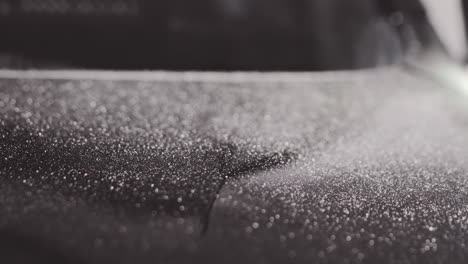 close up dust particle on dirty car hood