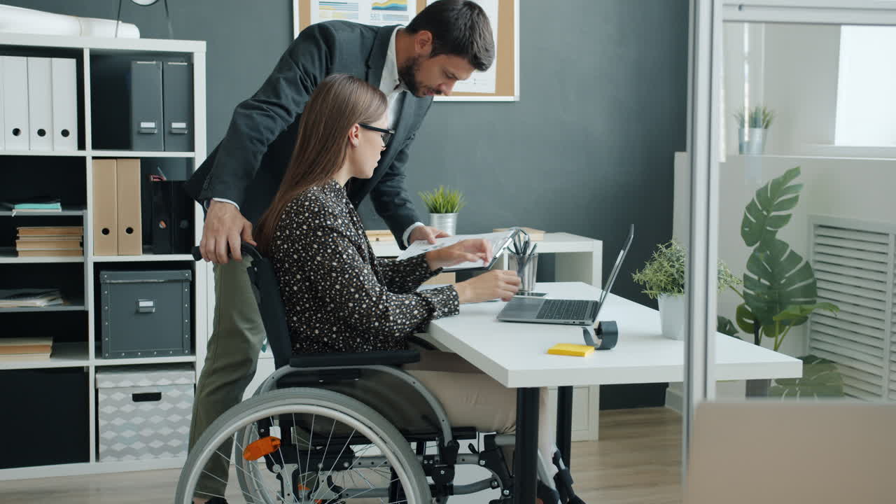 Business Meeting with an Employee in a Wheelchair