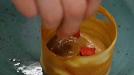 chocolate mousse with strawberries in a crisp cup