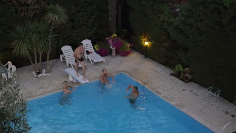 family in the swimming pool on resort