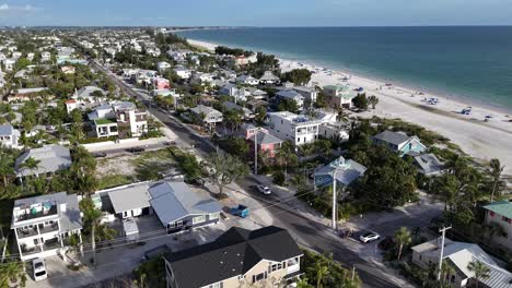slow turn aerial looking south to holmes beach on anna maria island, beautiful coastal florida