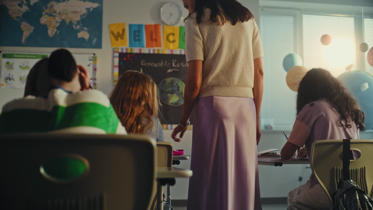 Primary School Children Opening Notebooks Preparing for Writing School Test