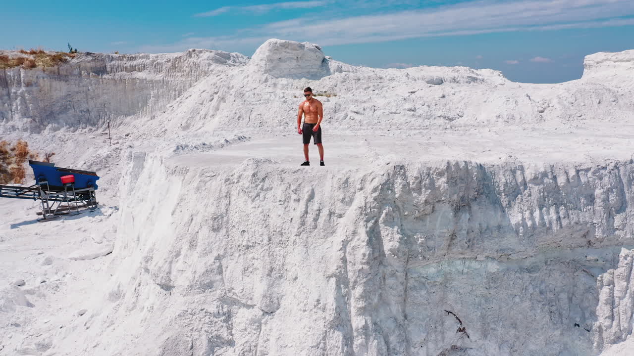 Professional bodybuilder posing. Concept of sport outdoors.
