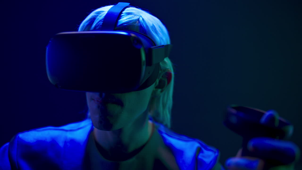 Excited man experiencing handheld trackpads videogame closeup. Future concept