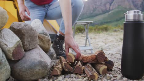 caucasian woman camping in nature.