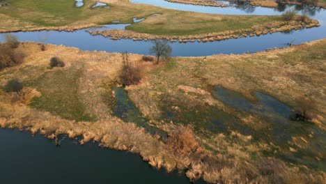 aerial shot of flooded fields and natural meander