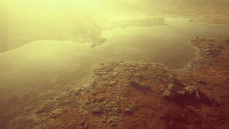 stunning golden hour landscape over rocky terrain and tranquil waters