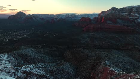 Flying-Over-The-Sedona-Landscape-During-Sunset-In-Winter