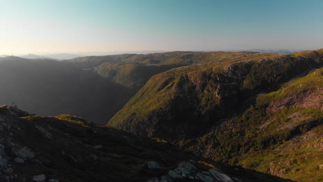 beautiful mountains and landscape in the sunset - aerial 4k