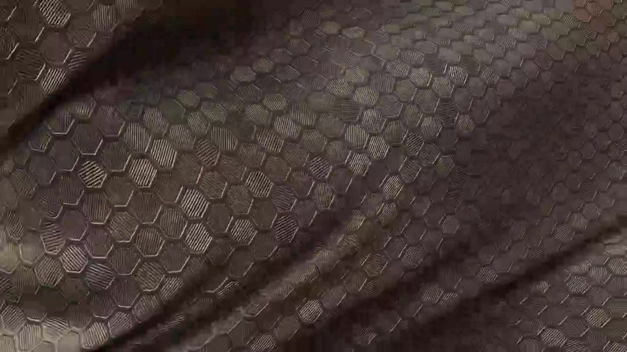 Simulazione di tessuto vinilico esagonale grigio.