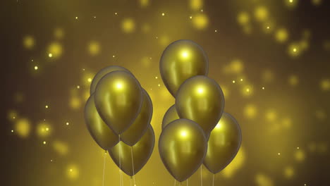 animación de globos dorados sobre un fondo dorado