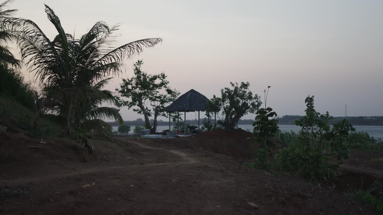 Tranquil Sunset Scene by the River with Gazebo