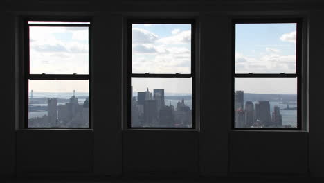 a view outside of windows of the empire state building in new york city new york