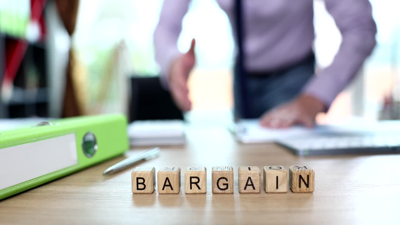 Bargain Handshake in Office Setting