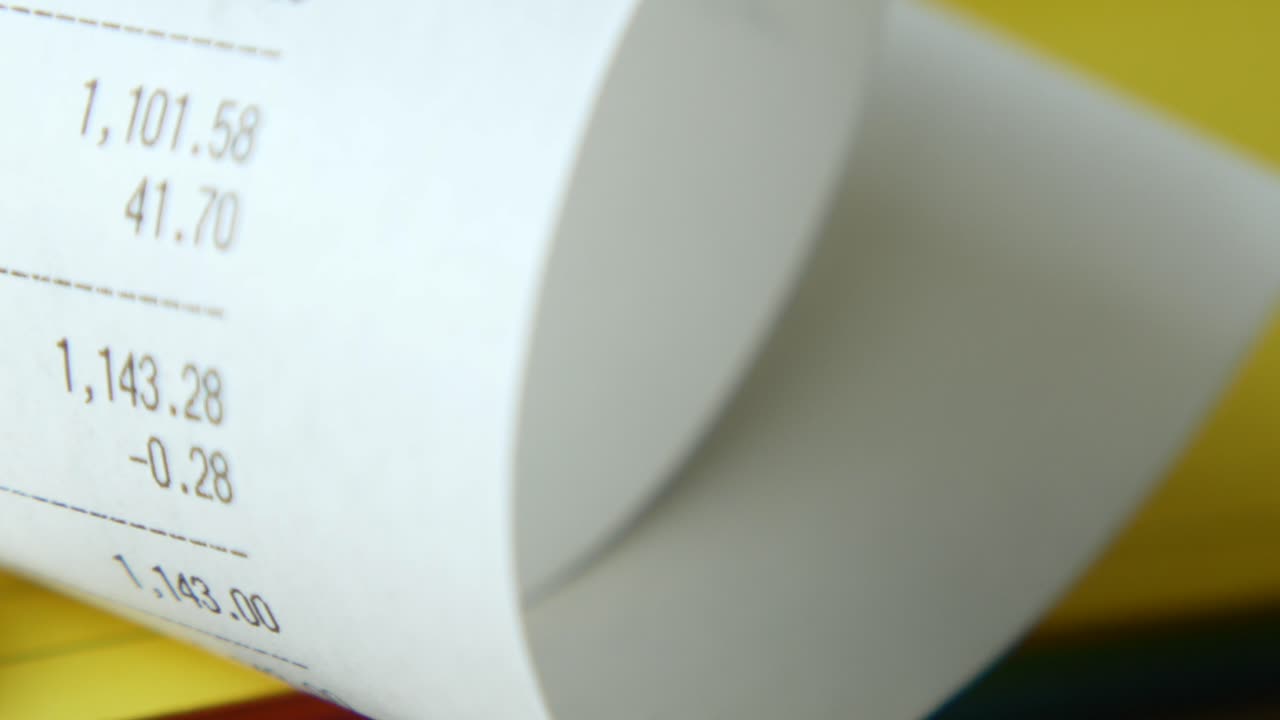 Rolled Receipt with Coins