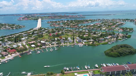 panning aerial drone view of luxurious coastal florida neighborhood in pinellas county