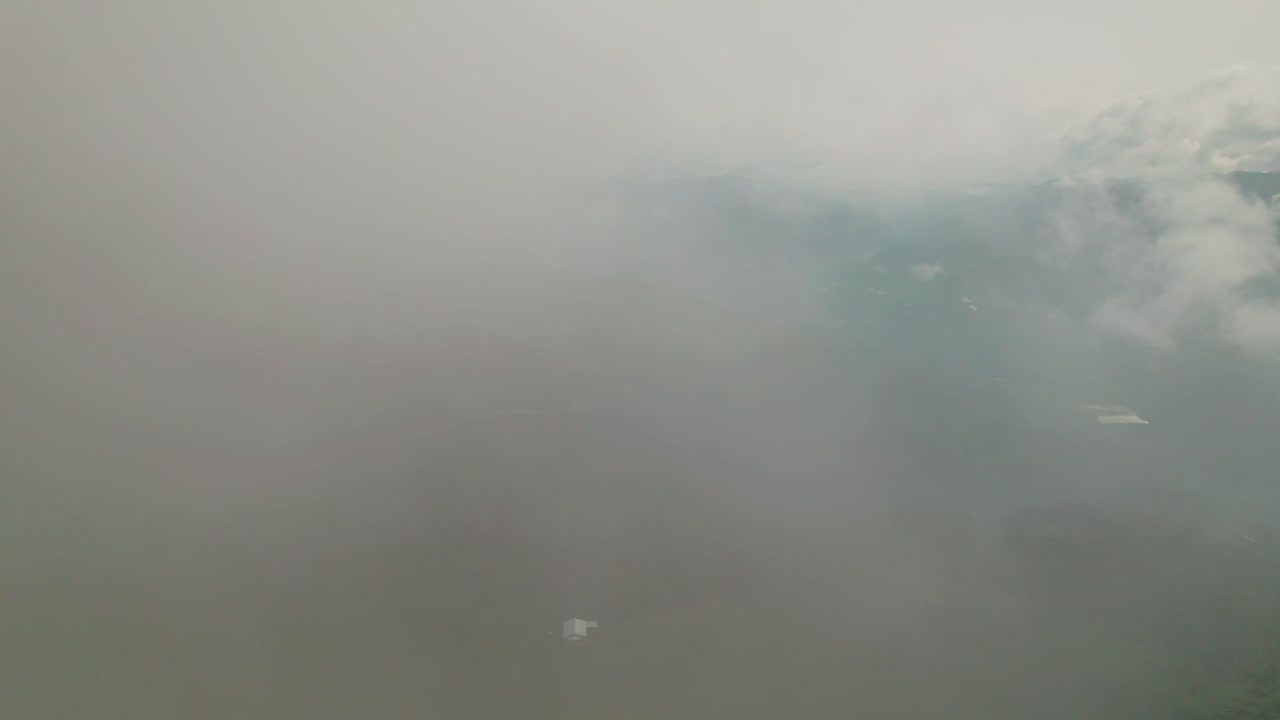 Baños, Ecuador, misty cloud forest, green Andean mountains, the valley town, and local wildlife. Ideal for travel and nature projects