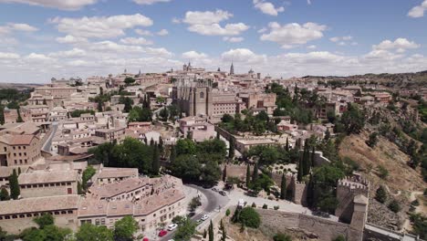 scenic drone view of toledo and monastery of san juan de los reyes