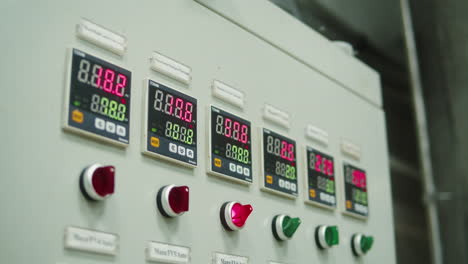 craft beer production factory, brewery manufacture. putting barley malt grains in conveyor close-up. brewing, cooking alcohol in metal vats bottles