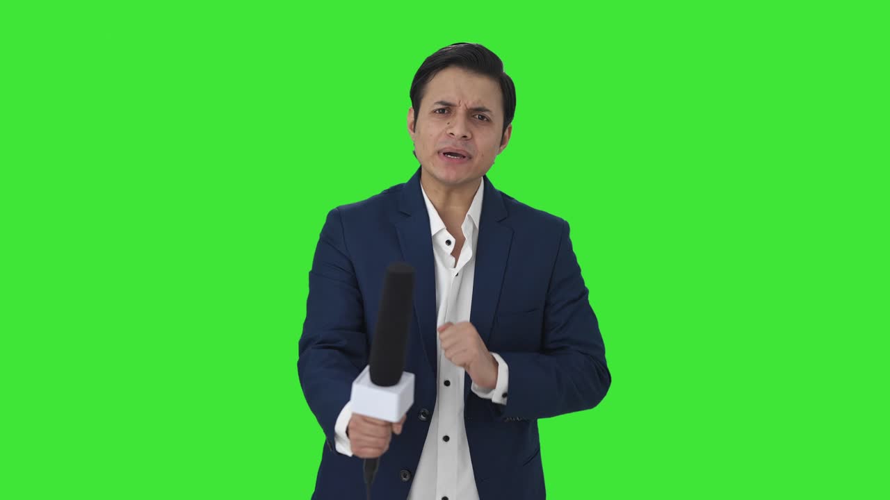 Angry Indian reporter asking questions Green screen
