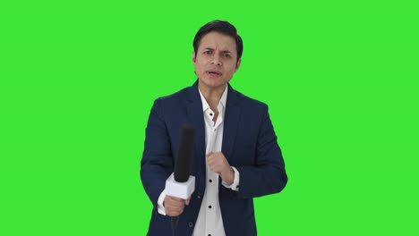 Angry-Indian-reporter-asking-questions-Green-screen