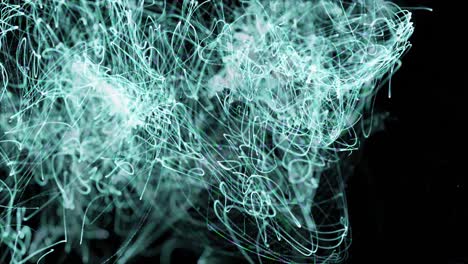 luces verdes senderos que se mueven contra un fondo negro