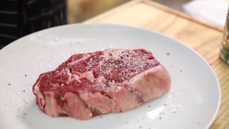 raw rib-eye steak ready to be cooked