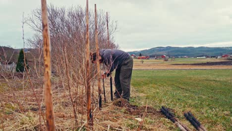 man constructing skigard in rural norway - timelapse