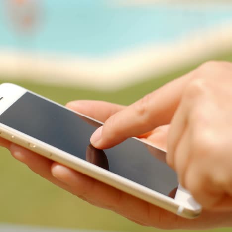 Close-Up-on-Woman-Hands-While-Using-Mobile-Phone