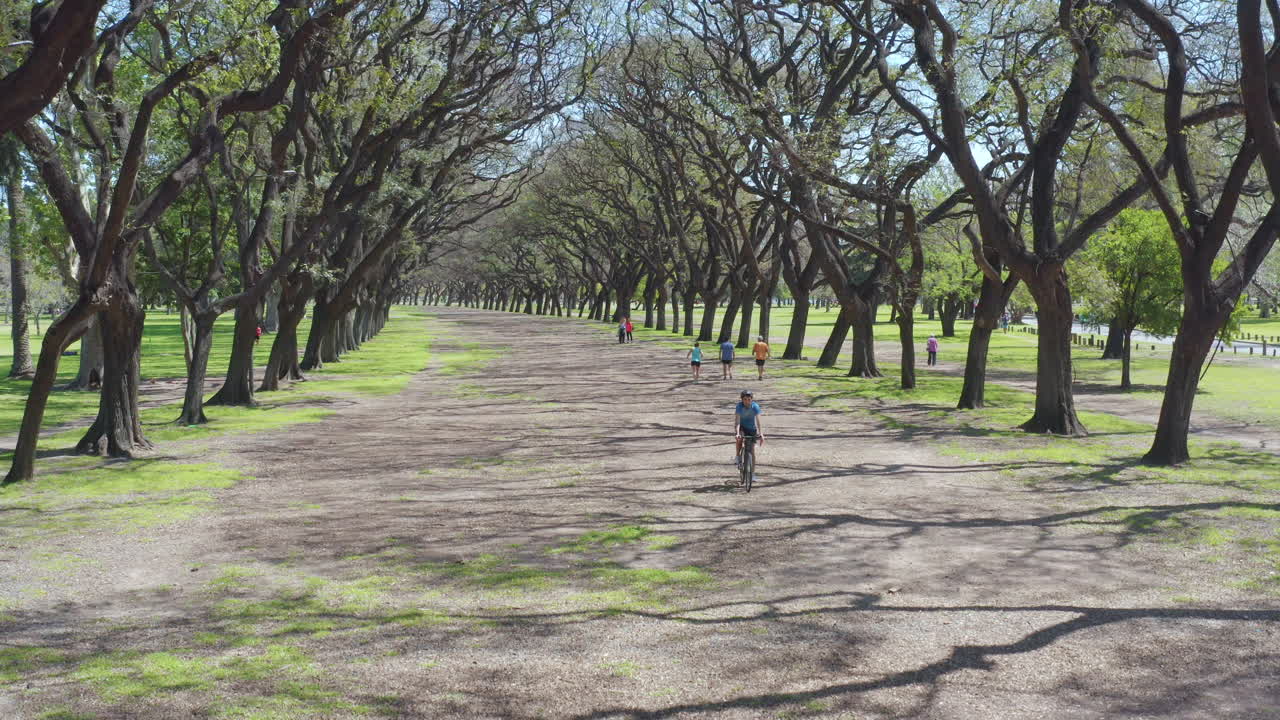 Man Riding Bike in the Park during Weekends