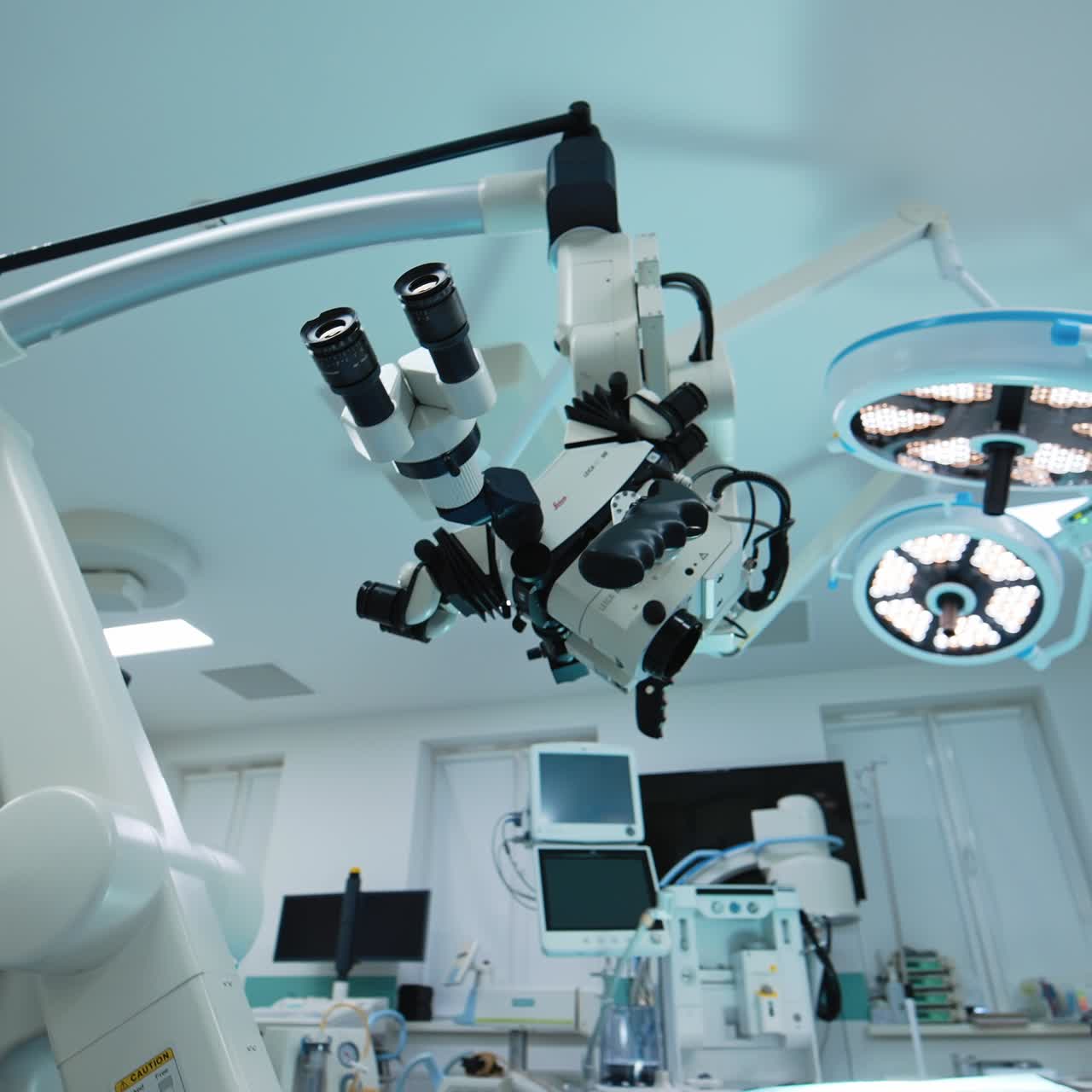 Innovative microscope for the neurosurgeons conducting operations. Low angle view on the medical equipment