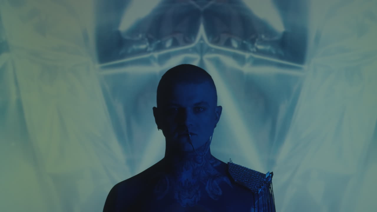 Gothic Man in Studio with Light Projection