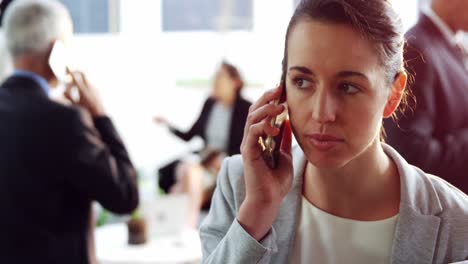 businesswoman talking on mobile phone