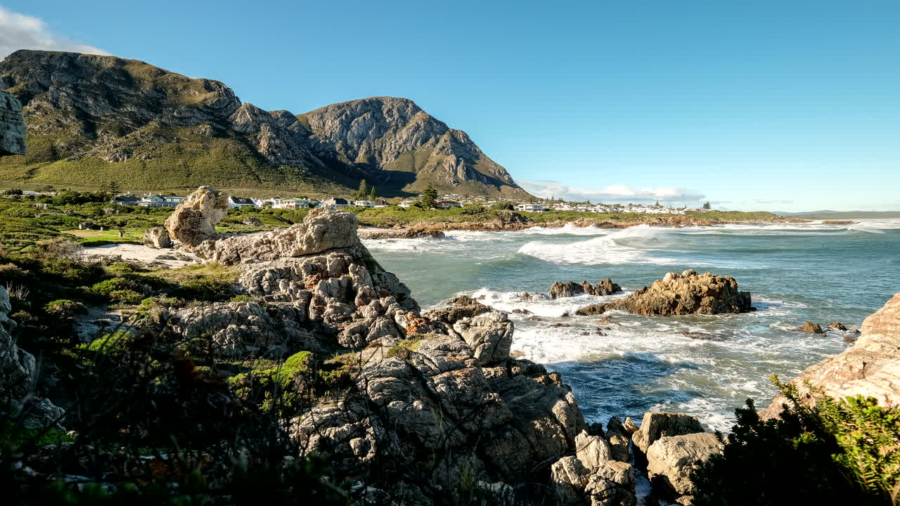 Time lapse of Atlantic waves crashing into rocky coastline in Voëlklip Hermanus