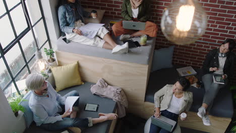 diverse business women brainstorming team discussing creative marketing strategy sharing ideas working on startup project together enjoying teamwork in relaxed modern office workplace top view